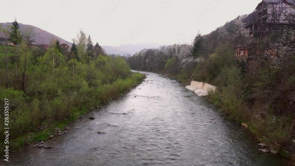 Two banks of Fresh cold mountain river village beautiful landscape Two banks of Fresh cold mountain river village beautiful landscape