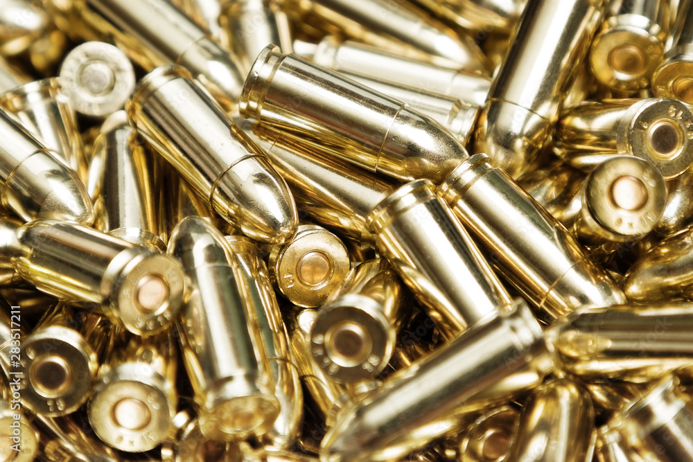 Fototapeta premium Heap of golden pistol ammo