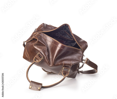 broun skin luggage bag open, isolated