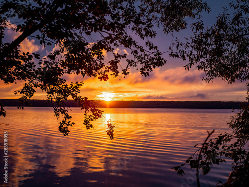 Orange summer sunset on the Russian river Volga © Юлия Зажигалина
