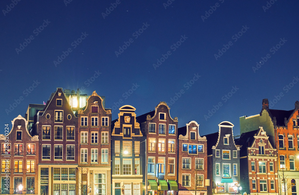 Brick houses in Amsterdam at night