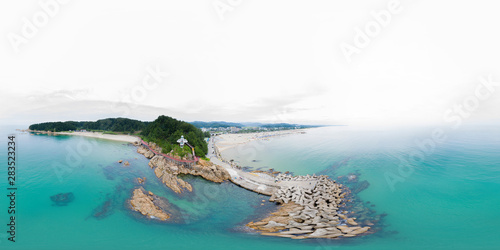Fototapeta Naklejka Na Ścianę i Meble -  Donghae, South Korea 6 August 2019: 360 degrees spherical panorama with beautiful beach. Drone shot of beach and island. VR content..
