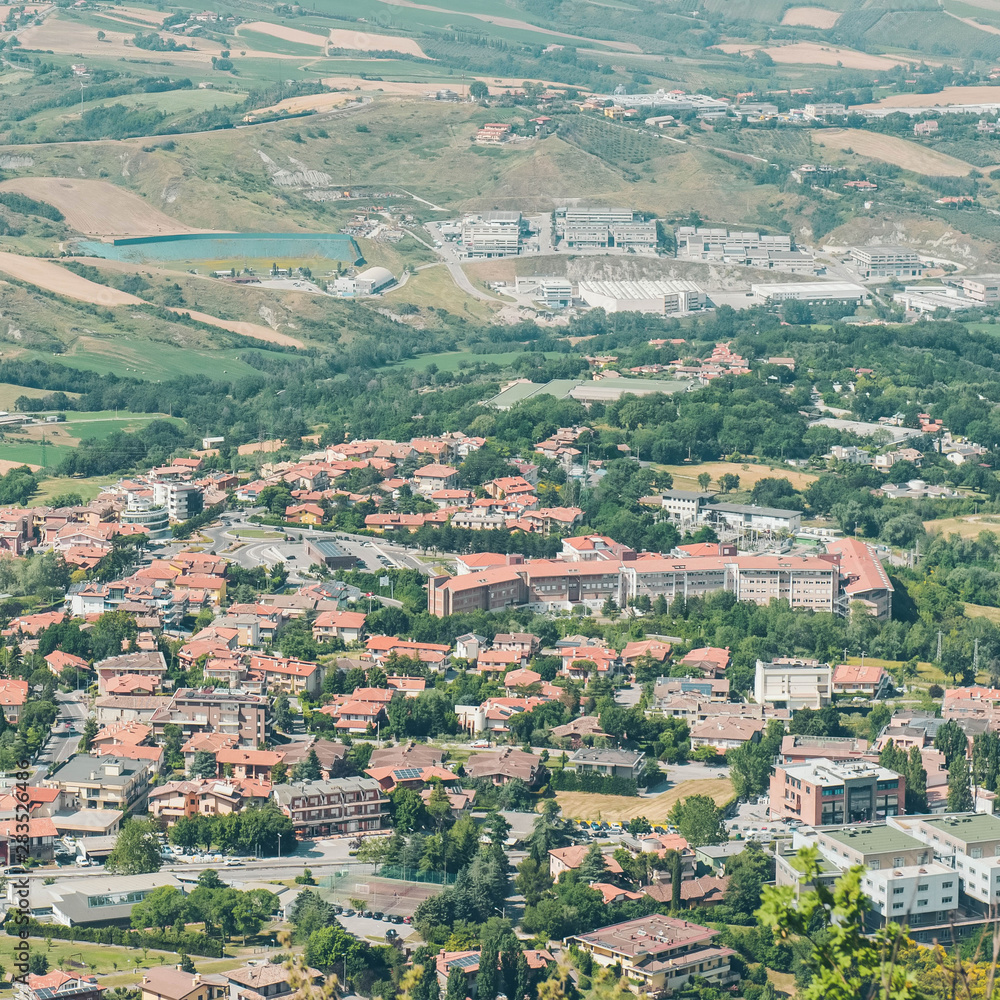 Panorama of Republic of San Marino. San Marino Suburban districts and Italian hills view from above. 
