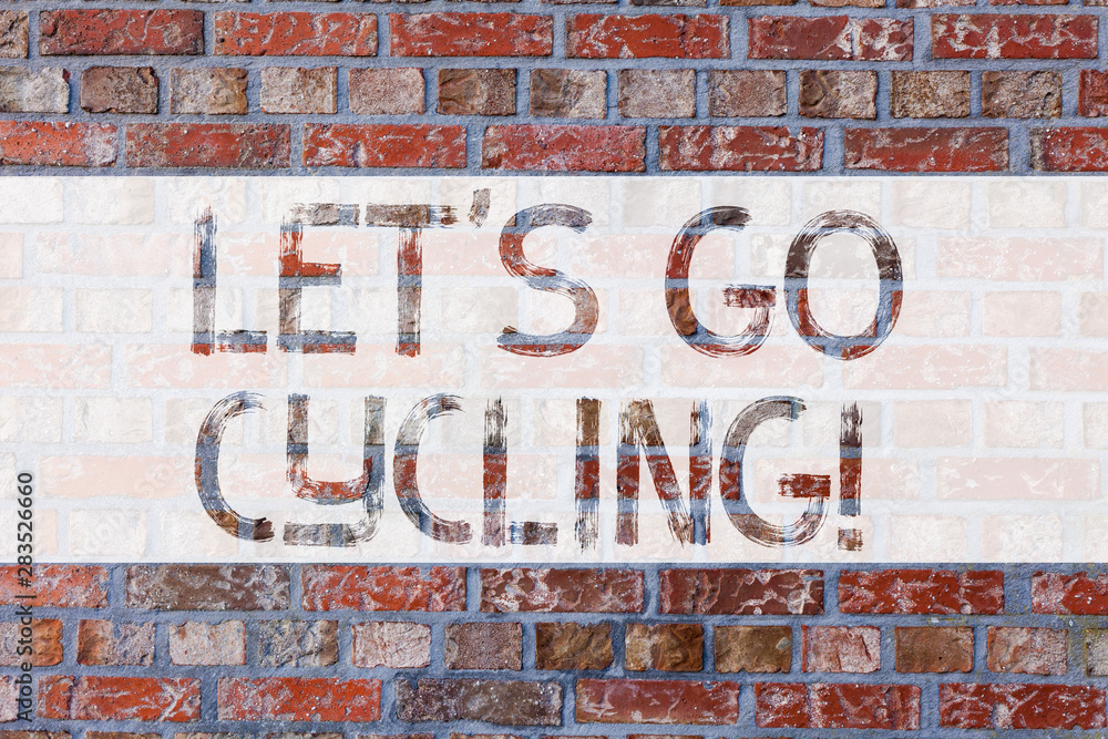 Handwriting text writing Let S Is Go Cycling. Concept meaning inviting someone to sport or activity of riding bicycle Brick Wall art like Graffiti motivational call written on the wall Handwriting text writing Let S Is Go Cycling. Concept meaning inviting someone to sport or activity of riding bicycle Brick Wall art like Graffiti motivational call written on the wall