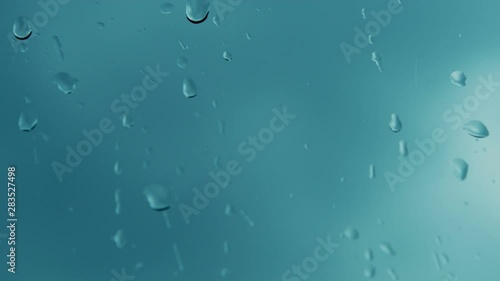 Wallpaper Mural Drop on glass slides against the sky Torontodigital.ca