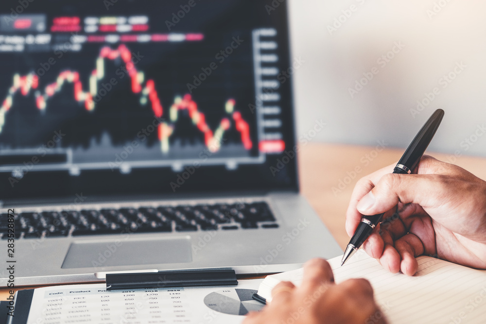 Business Team Investment Entrepreneur Trading discussing and analysis graph stock market trading,stock chart concept Business Team Investment Entrepreneur Trading discussing and analysis graph stock market trading,stock chart concept