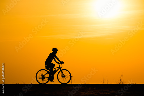 Wallpaper Mural Silhouette man cycling on sunset background Torontodigital.ca