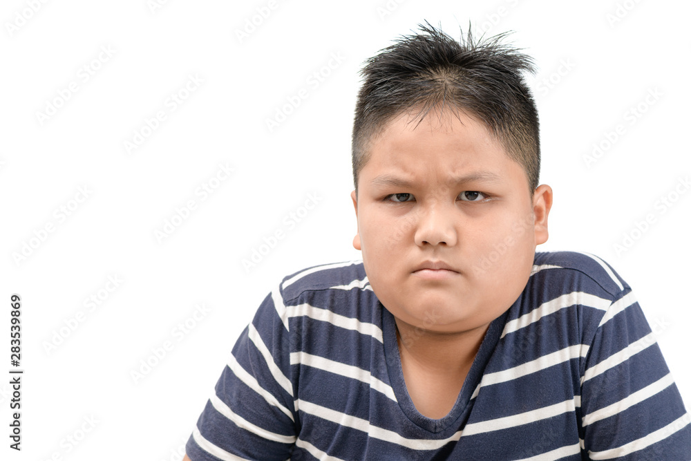Obese fat asian boy angry expressing negative emotion Obese fat asian boy angry expressing negative emotion