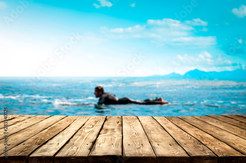 Photography Table background and surfers in the sea view
