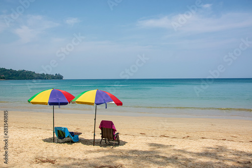 Rainbow umbrella spread on Karon beach  in Phuket Thailand.