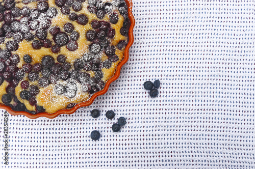 blueberry cake on a white tablecloth