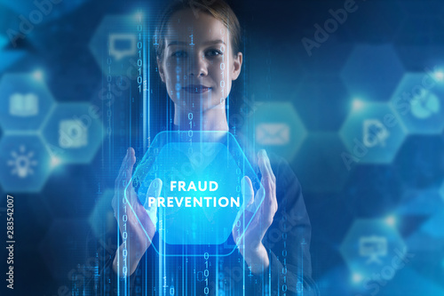 The concept of business, technology, the Internet and the network. A young entrepreneur working on a virtual screen of the future and sees the inscription: Fraud prevention