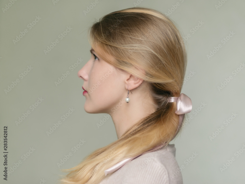 Portrait of beautiful and tender young woman. Portrait of beautiful and tender young woman.