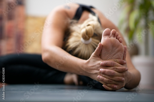 woman doing stretching at yoga