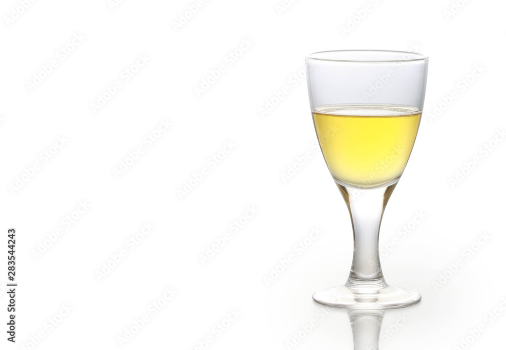 Glass of white wine on a white background Glass of white wine on a white background