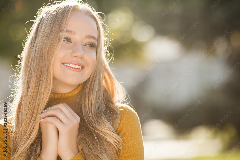 Closeup portrait of young beautiful woman. Female outdoors. Closeup portrait of young beautiful woman. Female outdoors.