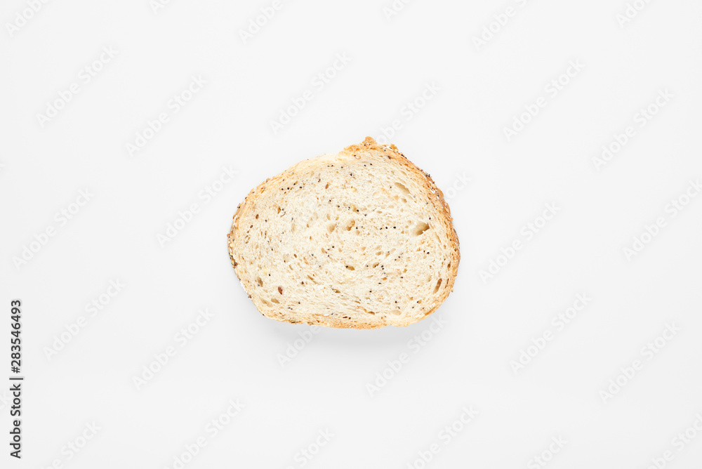 Slice of freshly baked homemade bread. White background. Slice of freshly baked homemade bread. White background.