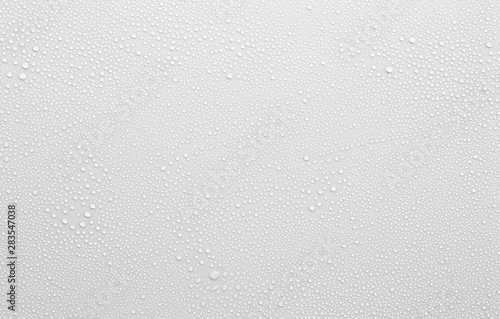 water drop on white surface as background