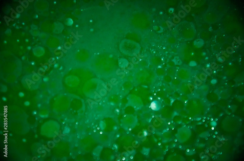 Wallpaper Mural Abstract bubbles green bokeh background Torontodigital.ca