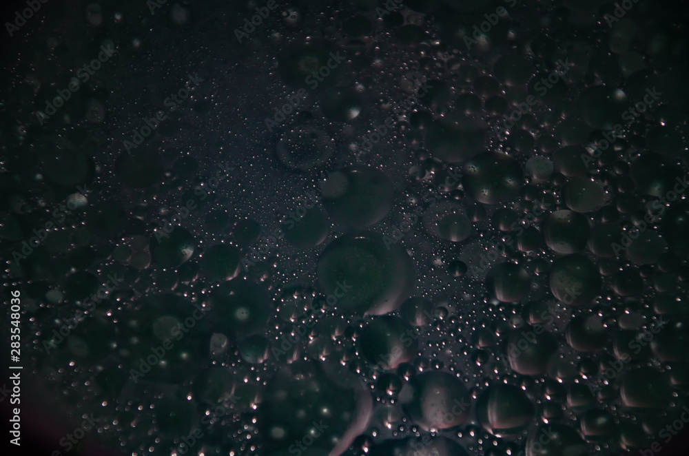 Abstract bubbles dark bokeh background