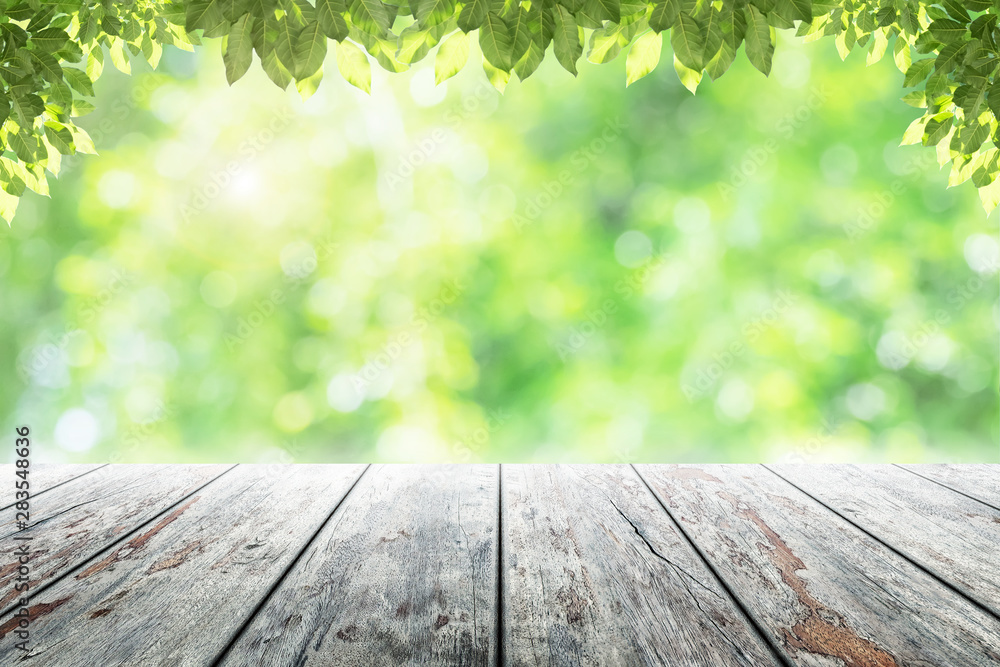 Empty wooden table with party in garden background blurred. Empty wooden table with party in garden background blurred.
