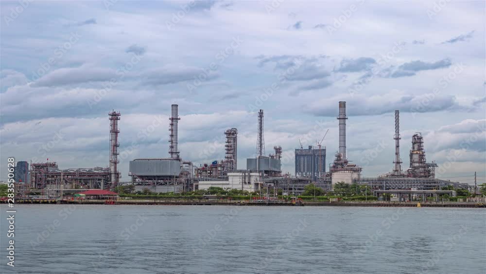 4K (3840p) Energy industry with blue sky background, timelapse technology production of petrol chemical at twilight, Global warming background is save energy and environment concept. 4K (3840p) Energy industry with blue sky background, timelapse technology production of petrol chemical at twilight, Global warming background is save energy and environment concept.