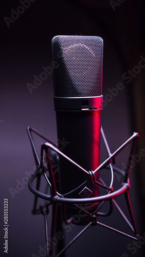 studio condenser microphone, with gradient background and red light photo