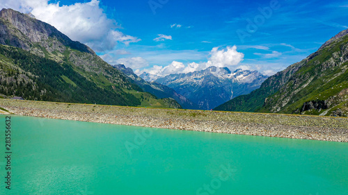 Amazing turquoise water of a glacier lake in Switzerland © 4kclips