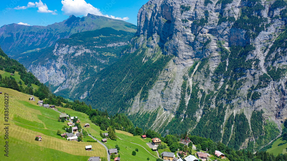 The village of Gimmelwald in the Swiss Alps - aerial view The village of Gimmelwald in the Swiss Alps - aerial view
