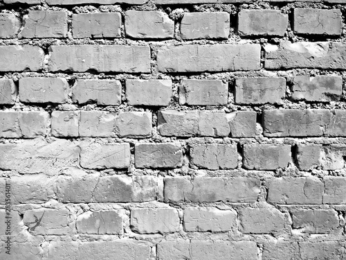 Black and white ruined brick wall photo background