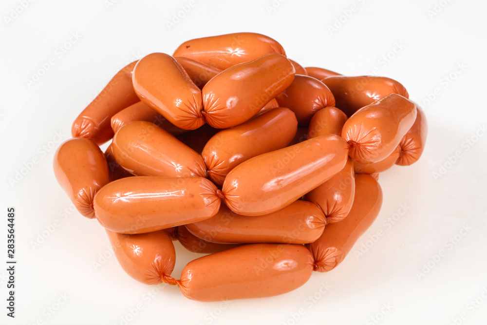 Tasty meat sausages over white background Tasty meat sausages over white background