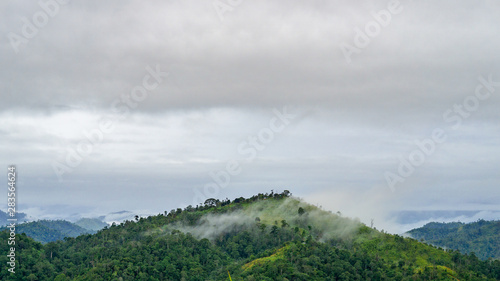 High mountains with fog covered in tropical rain forest  Thailand  Ratchaburi
