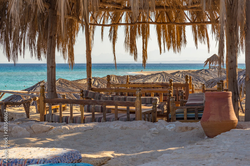 tables and benches at beach of Mahmya island egypt