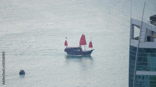 slow-motion of boat at Hong Kong bay photo