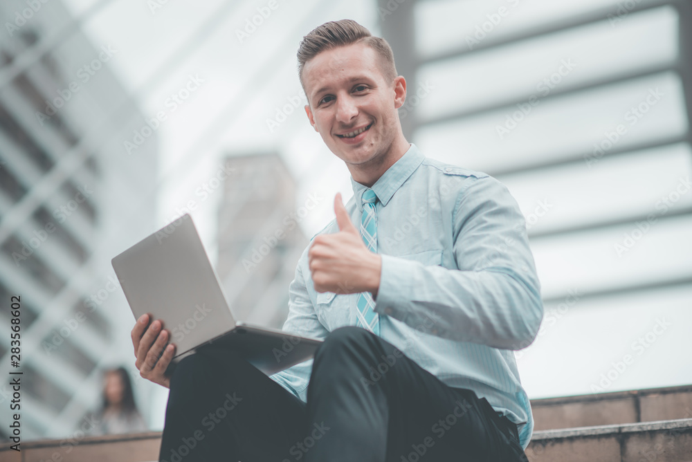 Young Business man successful with computer laptop working. Business office man happiness . Financial man business success freedom. Celebrate business concept. Young Business man successful with computer laptop working. Business office man happiness . Financial man business success freedom. Celebrate business concept.