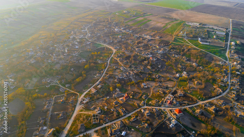 A charming shot of a nice-looking village, aerial view.