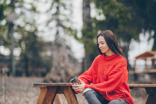 Woman relaxing in the forest on weekeend photo