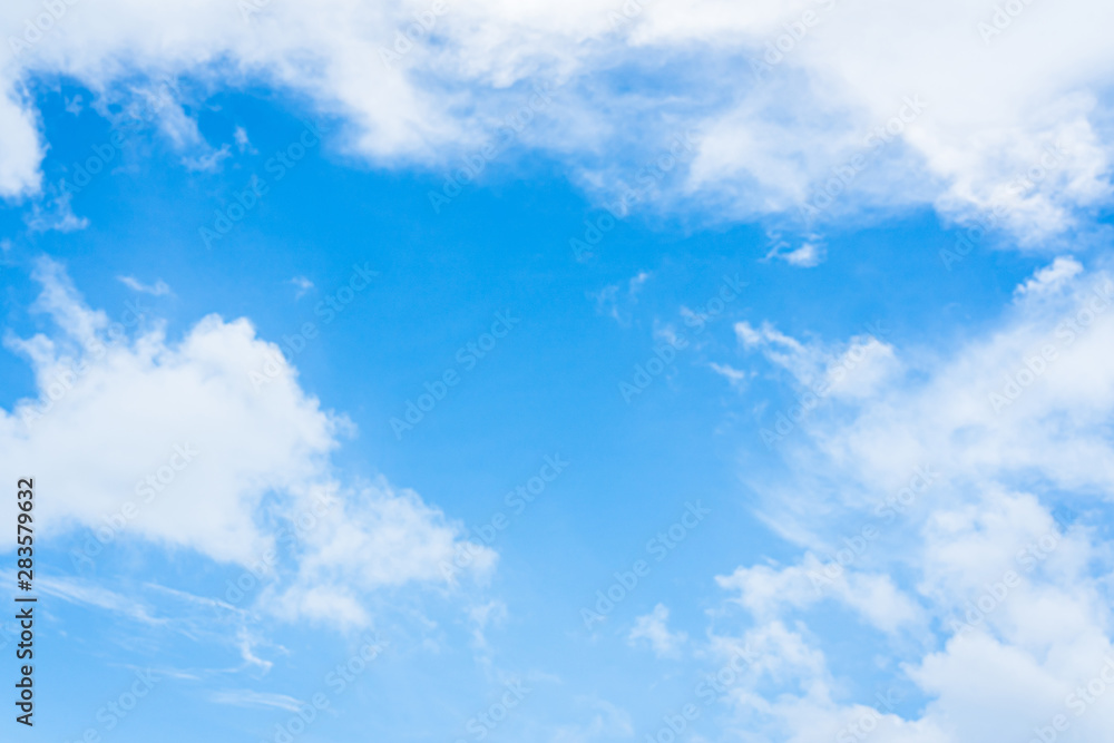 Blue sky background with clouds in sunny day.