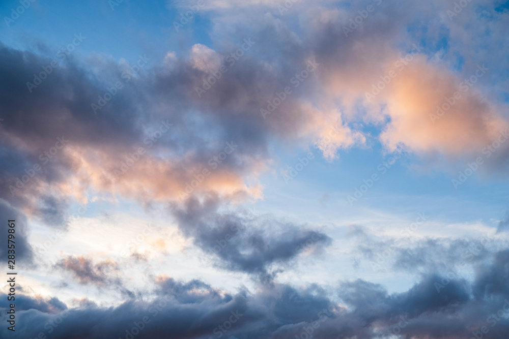 Clouds near sunset before rain blue sky Clouds near sunset before rain blue sky