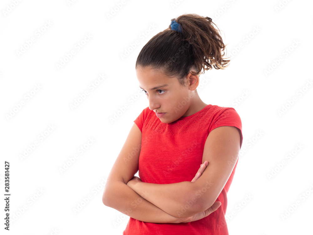 close up shot of an angry teenager isolated on white background close up shot of an angry teenager isolated on white background