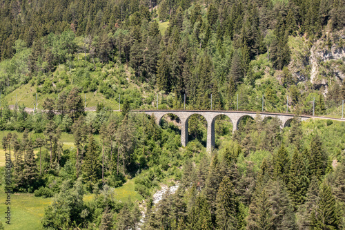 View from the historic Landwasser Viaduct of the Rhaetian Railway near the village Filisur, Swiss Alps