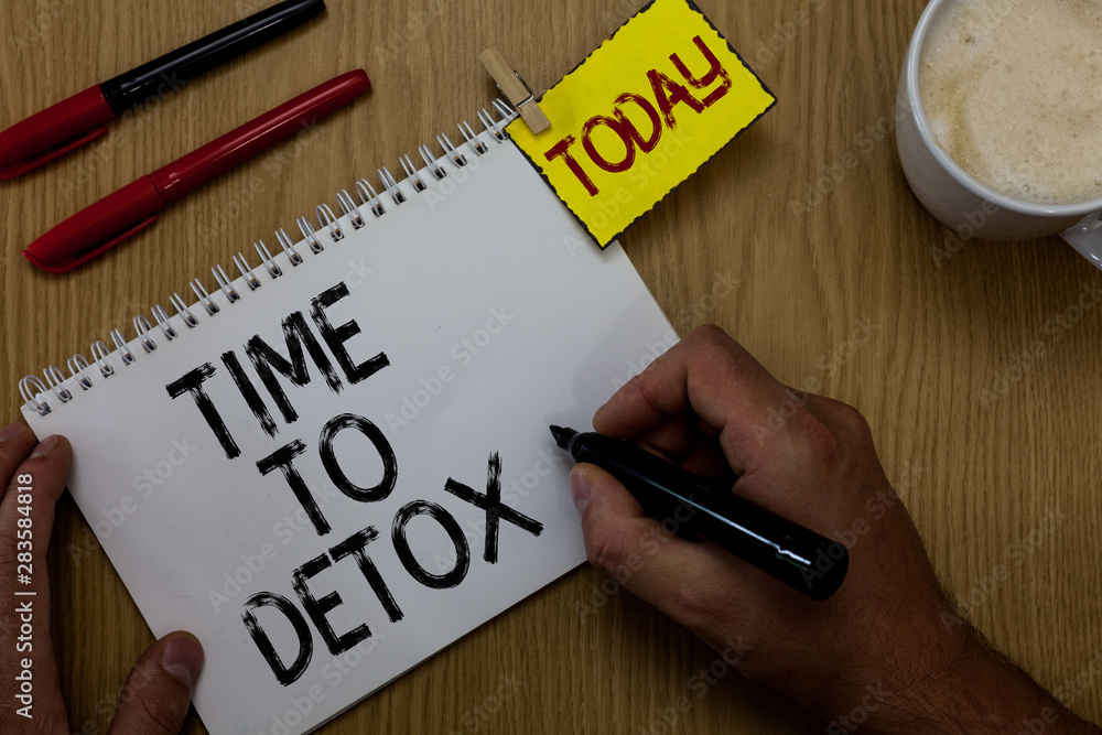 Handwriting text writing Time To Detox. Concept meaning Moment for Diet Nutrition health Addiction treatment cleanse Man holding marker notebook clothespin reminder wooden table cup coffee Handwriting text writing Time To Detox. Concept meaning Moment for Diet Nutrition health Addiction treatment cleanse Man holding marker notebook clothespin reminder wooden table cup coffee