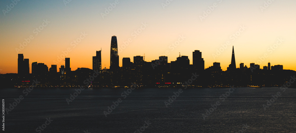 Panoramic beautiful scenic view of the San Francisco city silhouette at dusk, California