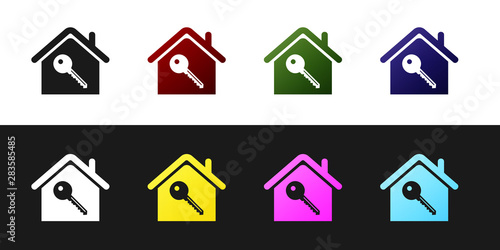 Set House with key icon isolated on black and white background. The concept of the house turnkey. Vector Illustration