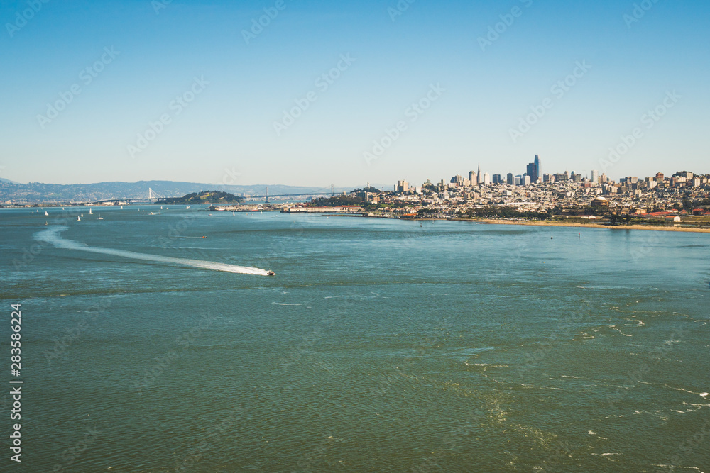 Panoramic symbolic view of San Francisco city on a sunny day with clear blue skies, California