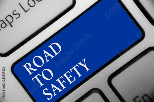 Text sign showing Road To Safety. Conceptual photo Secure travel protect yourself and others Warning Caution Keyboard blue key Intention create computer computing reflection document