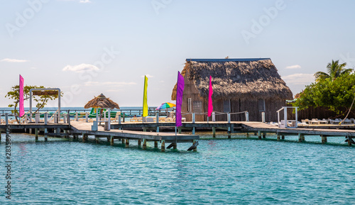 Diving Facilities in Belize Island. Small tropical island at Barrier Reef with paradise beach, known for diving, snorkeling and relaxing in the beach. Caribbean Sea, Belize, Central America. photo