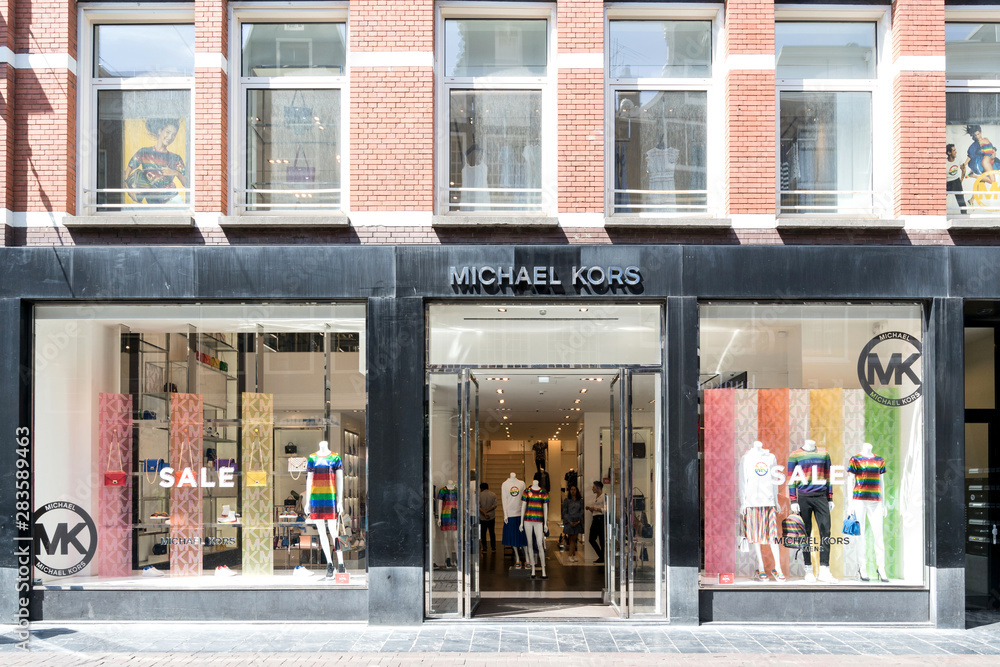AMSTERDAM, THE NETHERLANDS - JULY 4, 2019: Michael Kors store. Michael Kors  sells men's and women's and ready-to-wear, accessories, watches, jewelry,  footwear and fragrance. Stock Photo | Adobe Stock