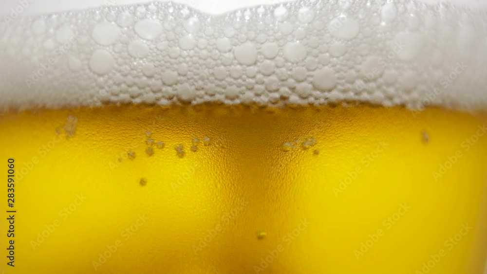 Cool fresh beer with condensation drops. beer in glass Cool fresh beer with condensation drops. beer in glass