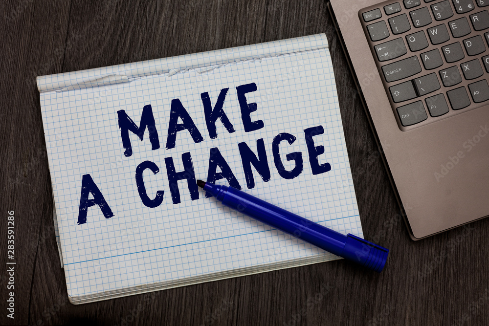 Conceptual hand writing showing Make A Change. Business photo text Create a Difference Alteration Have an Effect Metamorphose Open notebook squared page black marker computer wooden background Conceptual hand writing showing Make A Change. Business photo text Create a Difference Alteration Have an Effect Metamorphose Open notebook squared page black marker computer wooden background